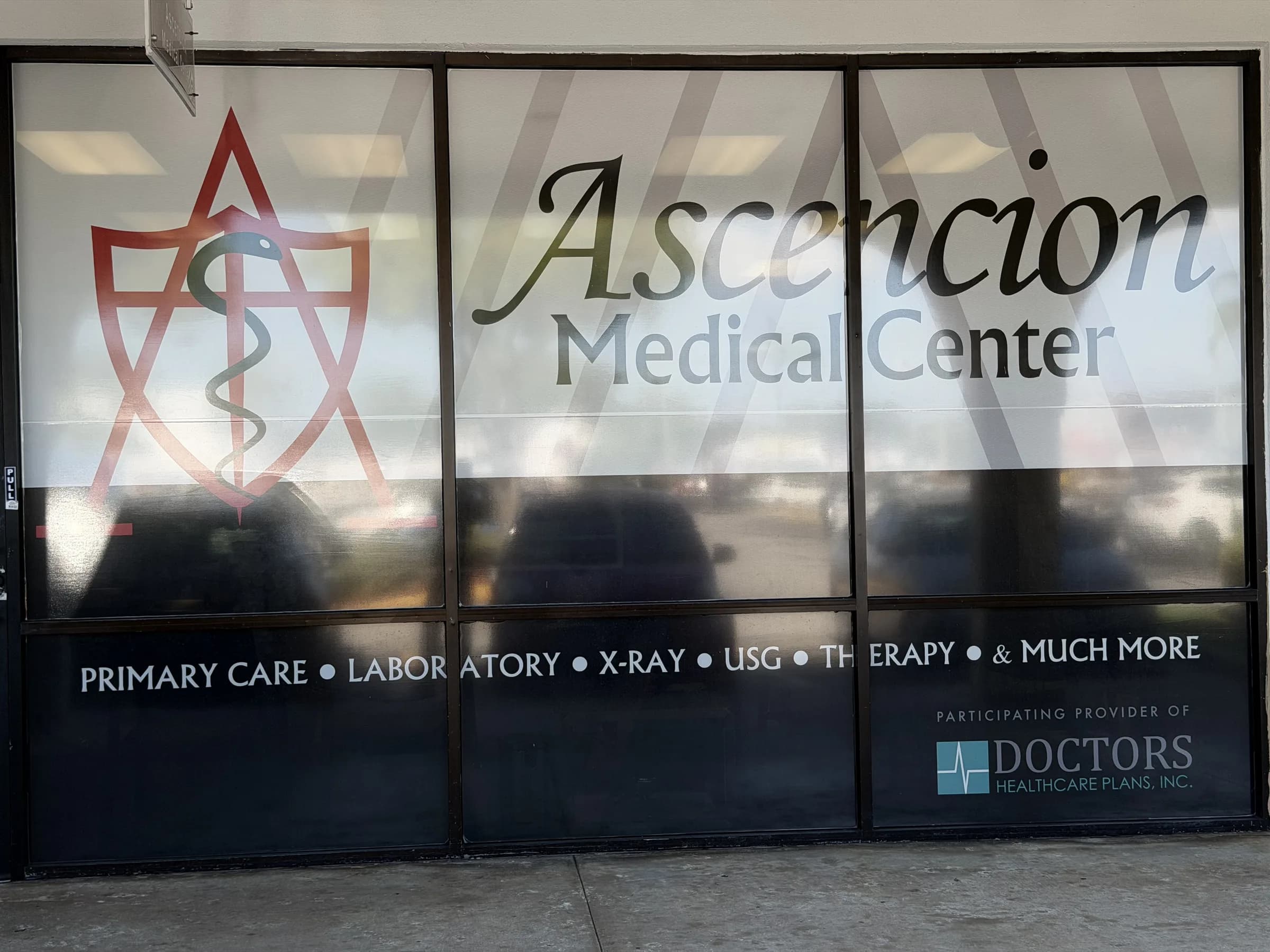 Wide front view of the clinic storefront.