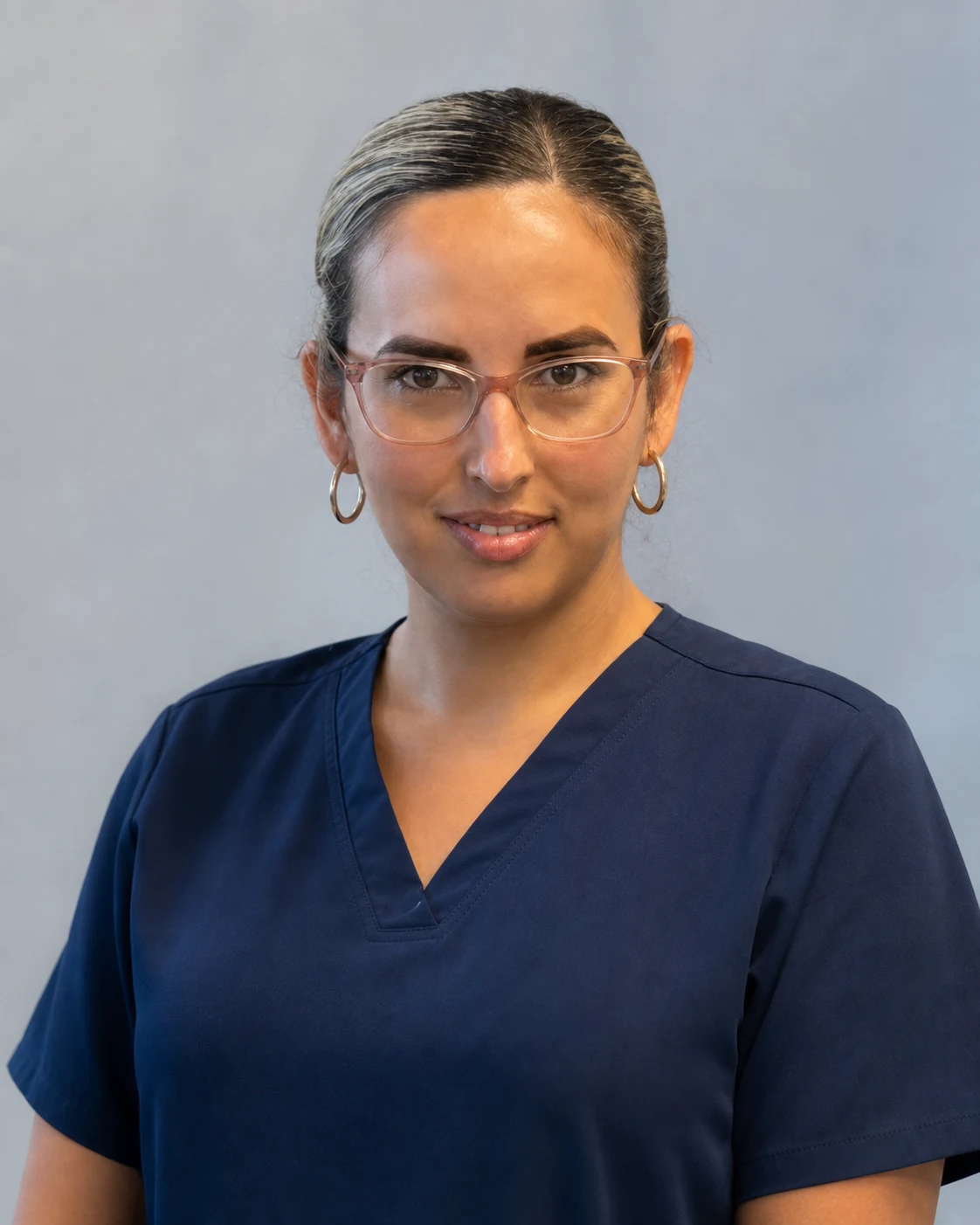 Temporary AI-assisted portrait of Ailin Diaz, a medical assistant at the Miami clinic, derived from authorized group photographs.